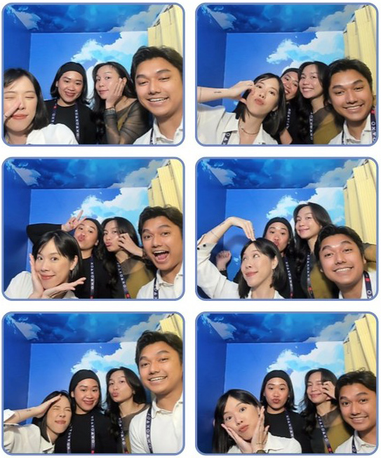 Work hard, pose harder? Hoffman Thailand strikes a pose at a photobooth after work.